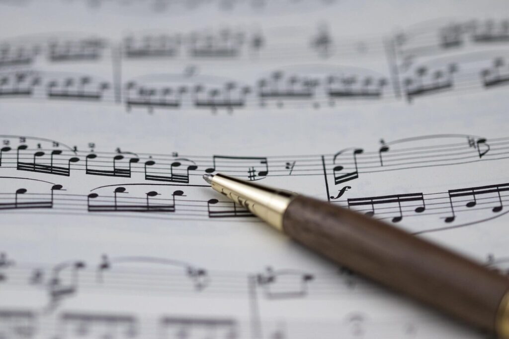 pen on sheet music